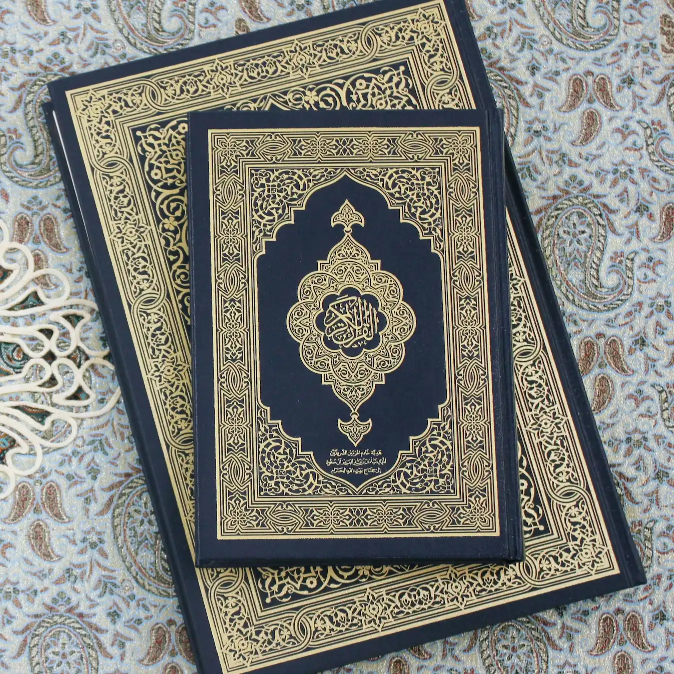 Open Quran with Arabic text - decorative background